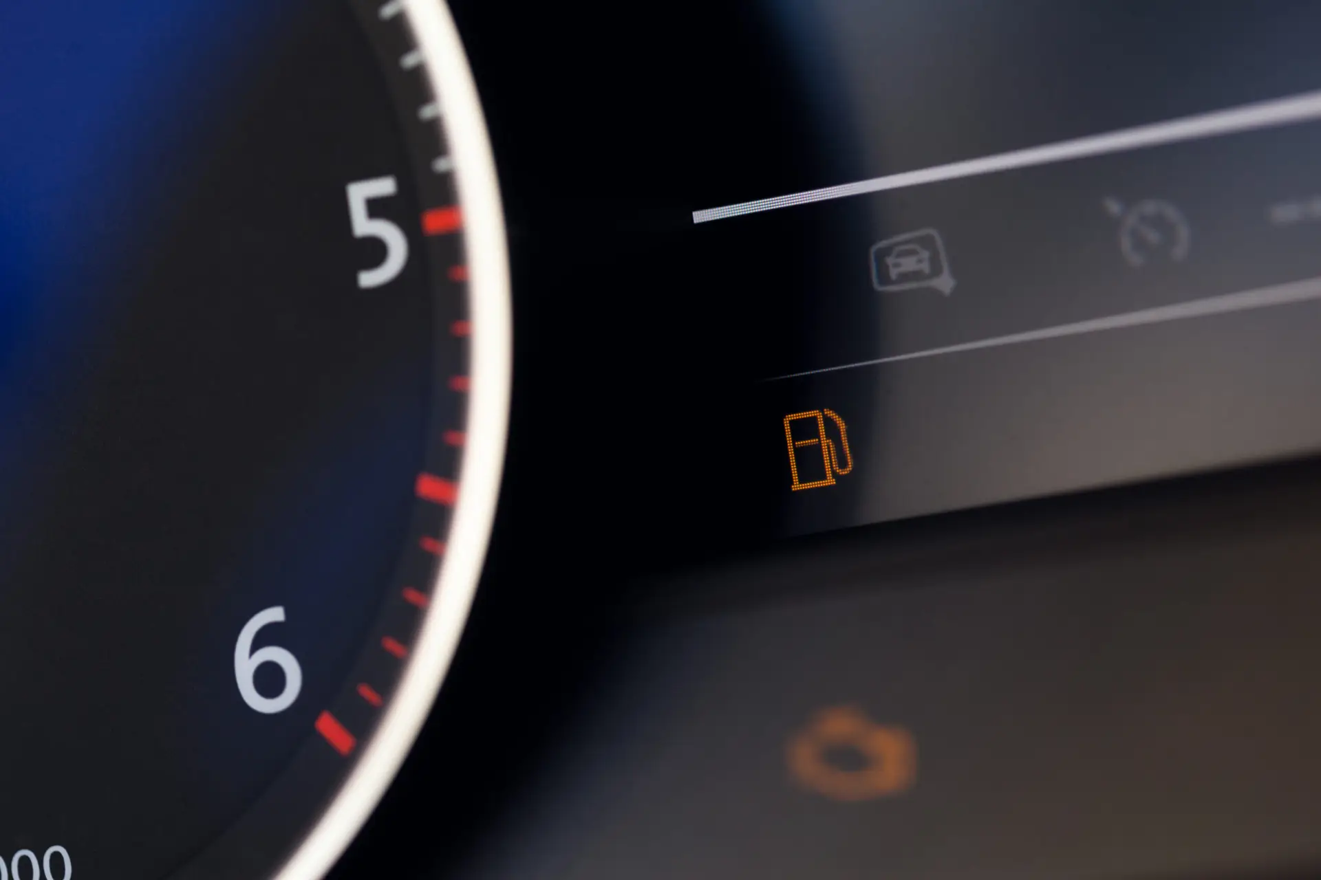 Close up shot of a speedometer in a car